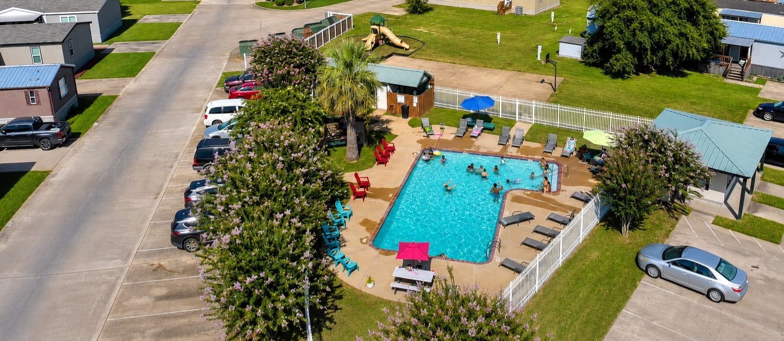 Aerial view of the Briarwood Estates community pool, patio and playground