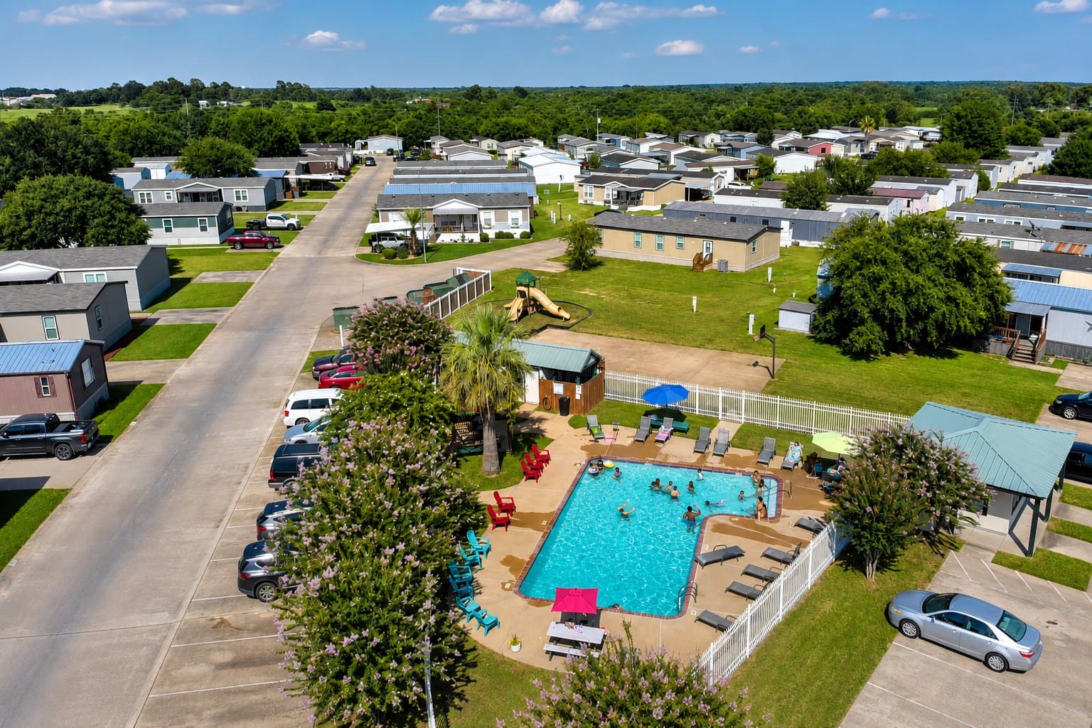 Aerial view of the Briarwood Estates pool area and community street
